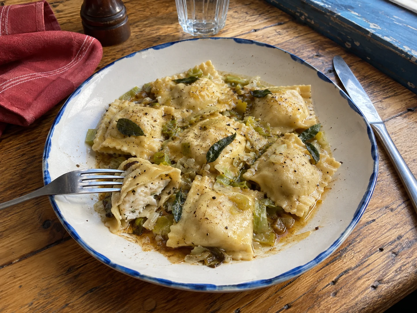 Handmade smoked haddock ravioli with leeks and brown butter